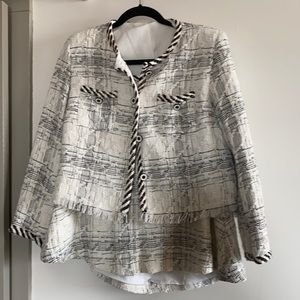 Size Large Tweed Suit. Great for formal dressing but still cute.